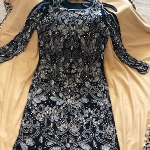 Beautiful beaded dress size 2 worn one time.